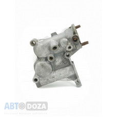 Корпус термостата Б/У на Mazda 626 GC/GD (второго и третьего поколения) годы выпуска с 1982 по 1992. Для двигателей FE 2.0L под инжектор 8 клапанов, оригинал (OEM)