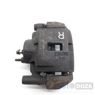 Суппорт Mazda 626 GF пер.(R) б/у