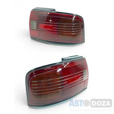 Задні ліхтарі пара для Mazda 323 BG (1989-1991) Koito 220-61600