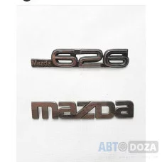 Шильдик крышки багажника Mazda 626 GD седан (к-кт 2шт.) б/у