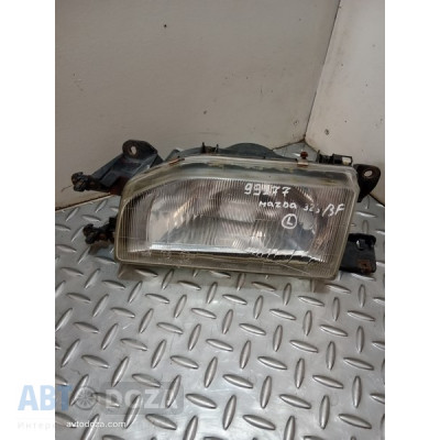 Фара Mazda 323 BF/BW (L рестайлинг) б/у - Купити в Одесі з доставкою по Україні