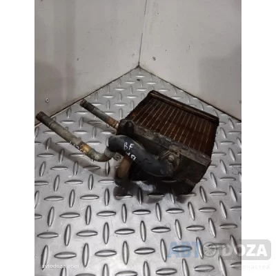 Радиатор печки Mazda 323 BF (L руль, съёмные патрубки) б/у - Купити в Одесі з доставкою по Україні.