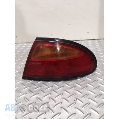 Задний фонарь (левый) Mazda 323F BA лифтбек б/у для надежного ремонта вашего автомобиля