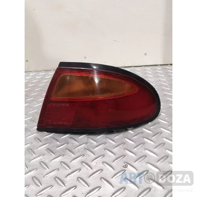 Задній лівий фонарь Mazda 323F BA (ліфтбек) б/у для надійного ремонту