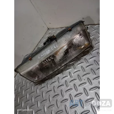 Фара Mitsubishi C62 (R без корректора) б/у - Купити в Одесі з доставкою по Україні.