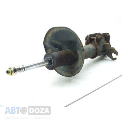 Стойка Nissan T12 голая пер.(L) б/у