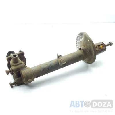 Стойка Nissan T12 зад.(L) голая под замену катриджа б/у